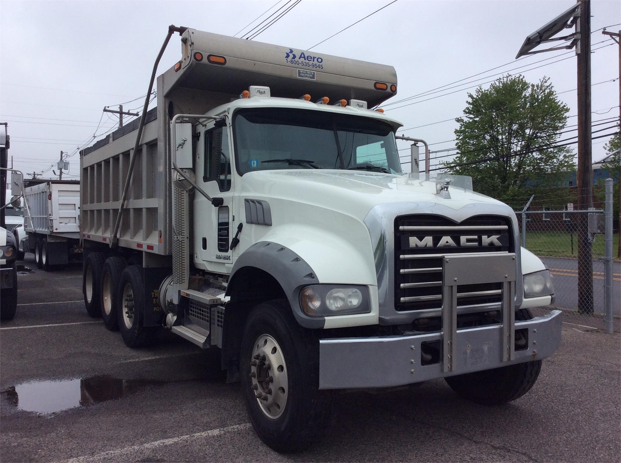メルシー 2010 Mack GU713 T/A Dump Truck in Eighty Four, Pennsylvania